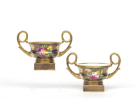 A pair of Spode Krater vases  c.1820, the squat forms with high handles and raised on square bases, richly decorated in patte