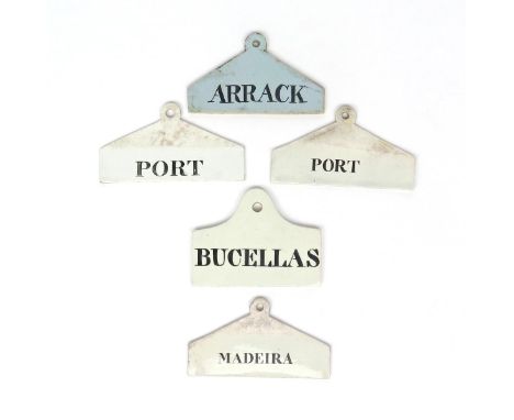 Four creamware bin labels  19th century, including Wedgwood, of coathanger form, titled 'Port', 'Madeira' and 'Bucellas', and