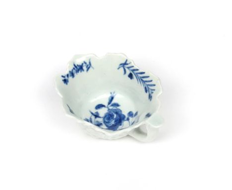 A Worcester blue and white butterboat  c.1760, painted with the Butterboat Formal Rose pattern, the exterior with geranium le