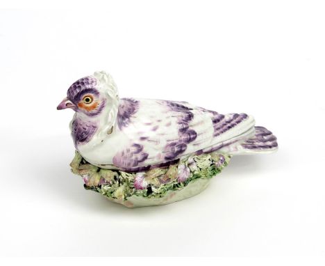 A Derby 'capuchine pigeon' tureen and cover  c.1760, naturalistically modelled with plumage picked out in purple enamel, seat