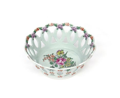 A Worcester circular basket  c.1760, finely painted to the interior well with a spray of flowers including pink rose, the rim