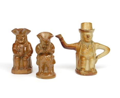 Two Fulham brown stoneware toby jugs  19th century, one of a snuff taker, standing and examining his snuff box, another seate