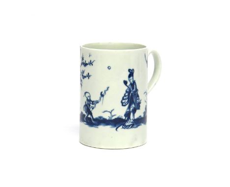 A Worcester blue and white mug  c.1765, painted with the Walk in the Garden pattern, a Chinese boy with a bird on the end of 