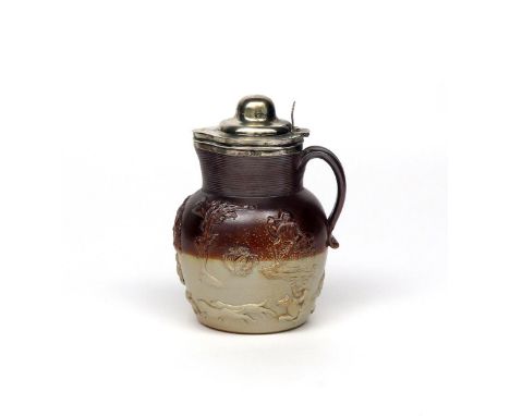 A silver-mounted Mortlake stoneware hunting jug  c.1819, applied with a continuous hunting scene beneath sprigs of trees and 