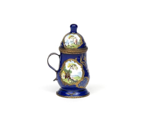 A Staffordshire enamel mustard pot and cover c.1780, the baluster form painted with panels of shepherds tending their flock r