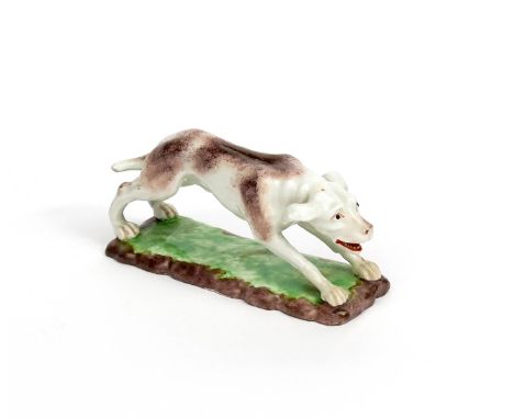 A Frankenthal model of a hunting dog  c.1770, depicted chasing its quarry, with mouth agape and ears pulled back by the wind,