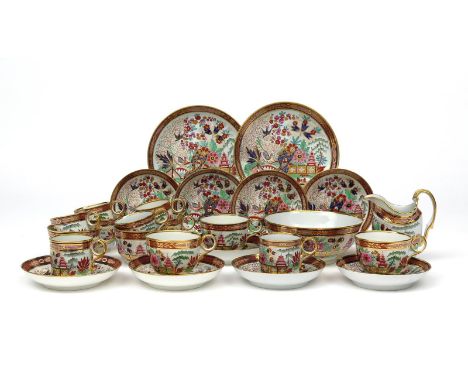 A Barr Flight and Barr part tea service  early 19th century, richly decorated in the Imari palette with a stylized Oriental l