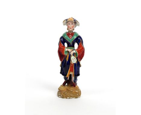 A Dudson Staffordshire figure of a Chinese lady  c.1840-50, wearing a bright costume and holding a fan, raised on a scrolled 