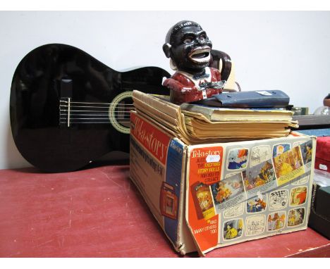 A Palitoy Tel-a-Story Entertainer (boxed), a brown Bakelite View-Master junior projector, jolly money bank, 1954 Lion annual,