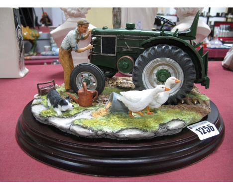 A Country Artists Model 'Cartridge Start - A Series 2 Field Marshall Tractor', boxed.