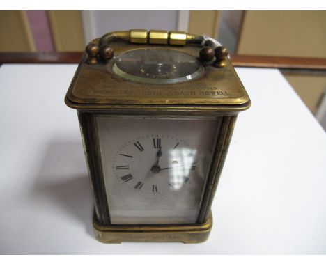 A Late XIX Century French Brass Carriage Clock (inscribed), enamel dial, imported by Howell James and Co London.