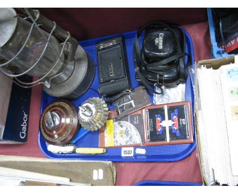 A Hurricane Lamp, two table lighters, Canon and Kodak camera's, pen knives, etc:- One Tray