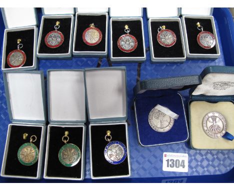 Six Hallmarked Silver and Red Enamel Medallion Pendants, "Newcastle Bakery Exhibition", all inscribed verso, two highlighted 