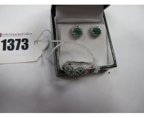 A Pair of Modern Emerald and Diamond Set Earstuds, oval four claw set to the centre, stamped "0.05" "18K"; together with a mo