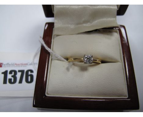 A Modern 18ct Gold Single Stone Diamond Ring, the brilliant cut stone claw set, stamped ".33".