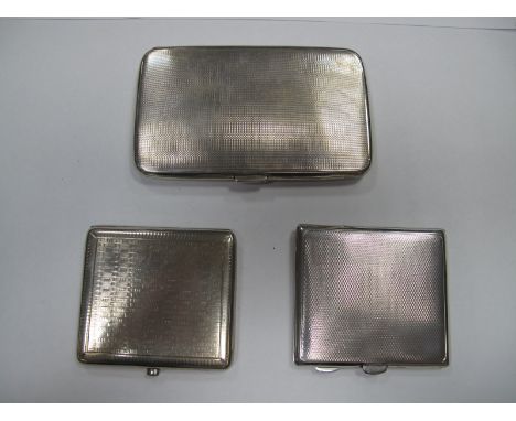 Three Silver Cigarette Cases, engine turned.