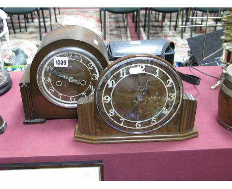 A 1930's Enfield Oak Cased Eight Day Mantel Clock,striking on a coil, and a contemporary Metamec walnut mantel clock. (2) 