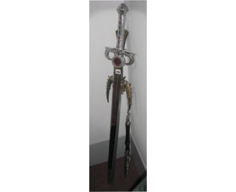 Two Fantasy Theamed Long Swords, including Thundercats themed, and a fantasy axe. (3)