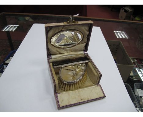 A Hallmarked Silver Mounted Brush and Comb Set, in original case with internal mirror.