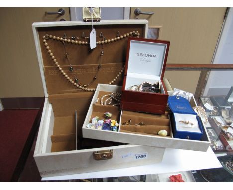 Assorted Costume Jewellery, including bar brooch stamped "9ct", beads, wristwatches, ceramic posy brooches, etc, contained in
