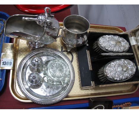 A Cased Pair of Hallmarked Silver Backed Brushes, with associated comb (damaged); a plated sugar scuttle, salt and pepper pot