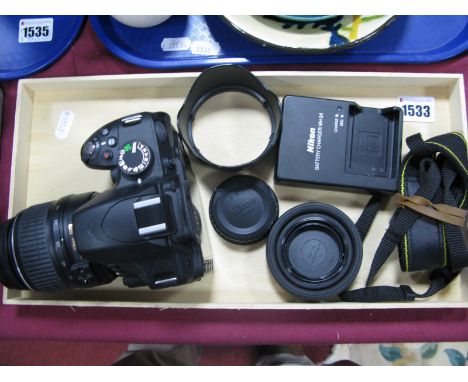 A Nikon D3200 SLR Camera, fitted with a Nikkor AF-5 DX ED 18-55mm lens.