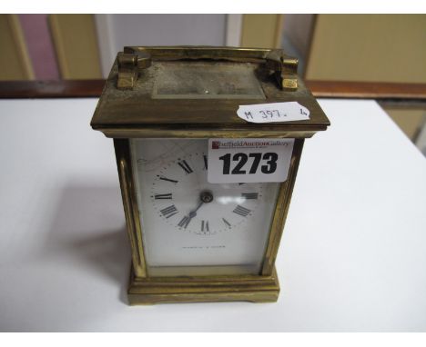 A Mappin & Webb Brass Cased Carriage Clock, with black Roman numerals to white enamel dial.