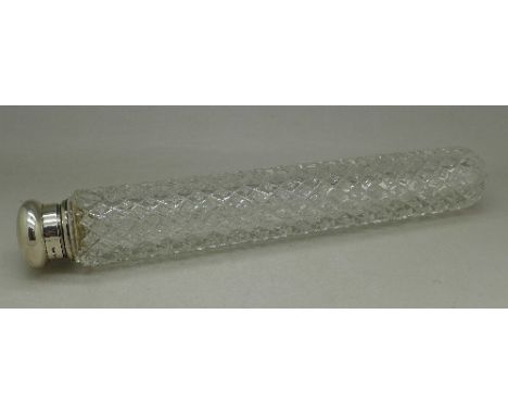 A cut glass cylindrical scent bottle/opera flask with threaded rim and silver top, circa 1900, 23cm - 9", in original crisp c