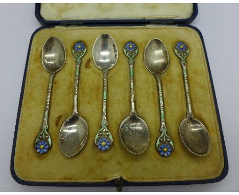 A set of six silver and enamelled Art Deco spoons, by Mappin & Webb, boxed, some enamel a/f, 46g