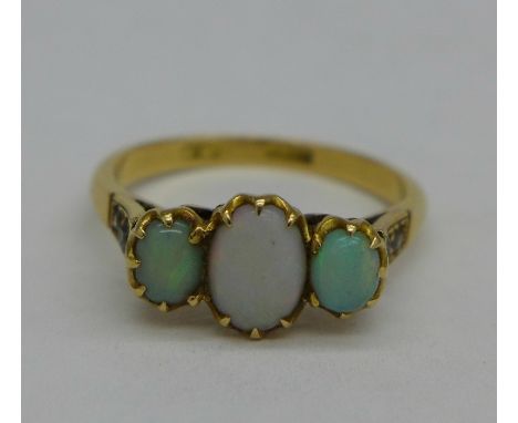 An 18ct gold, opal and diamond ring, 3.6g, O