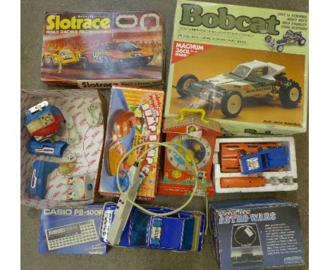 A Gyk Ayk Racing Bobcat, Astro Wars, boxed, Casio PB-100F personal computer, RC cars, robot, etc.