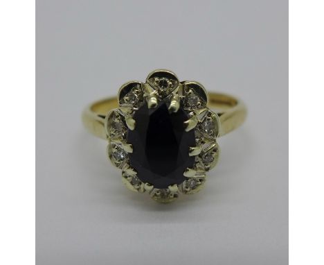 A 9ct gold, sapphire and diamond ring, 3.2g, M