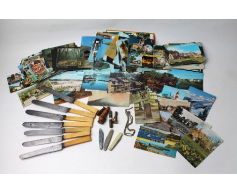 Box of vintage postcards, penknives including 1937 souvenir Coronation penknife, seal stamps and Victorian bone handled cutle