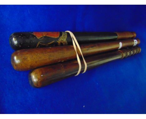 Group of 3 Truncheons: Victorian truncheon, stamped '(Crown) / CP', ribbed handle, 44 cm; Victorian truncheon, 'VR' (on red c