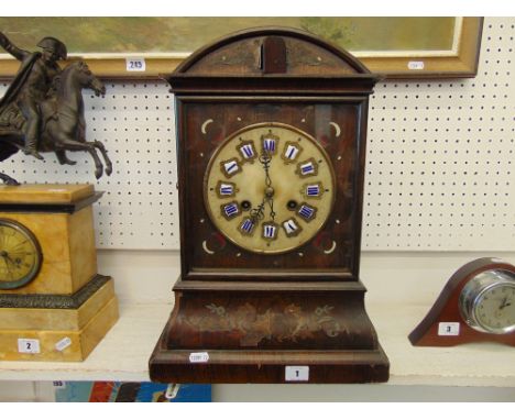 A Mahogany brass inlaid mantle clock