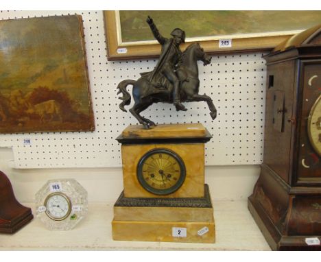 A marble and spelter mantle clock, Horseman