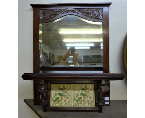 A mahogany and tiled wall shelf and a mahogany mirror