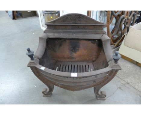 A cast iron fire grate 