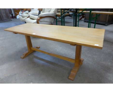 A Wren Man light oak coffee table