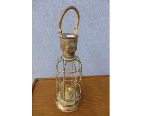 A storm lamp garden lantern