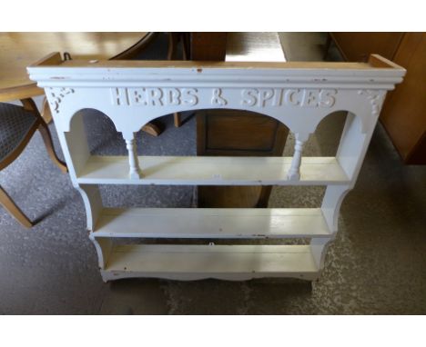A painted pine spice rack