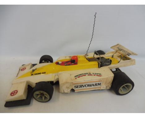 A SG racing Futura Indy race car, 1978, with a nitro engine, made in Italy, rare.