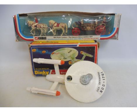 A boxed Dinky Toys Star Trek USS Enterprise, plus a Corgi state landau.