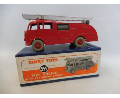 A boxed Dinky Toys Commer Fire Engine, no. 555.