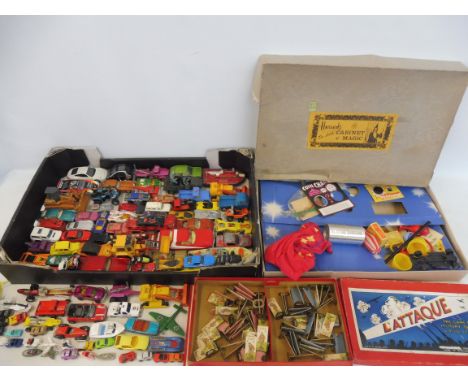 A mixed box of playworn models including Corgi, Britains and Matchbox plus a Hamleys part magic set and an early military tac