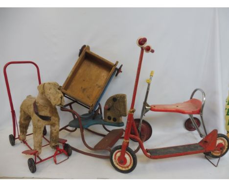 A group of large scale toys including a Gee Gee Rocker, Tri-ang tricycle etc.