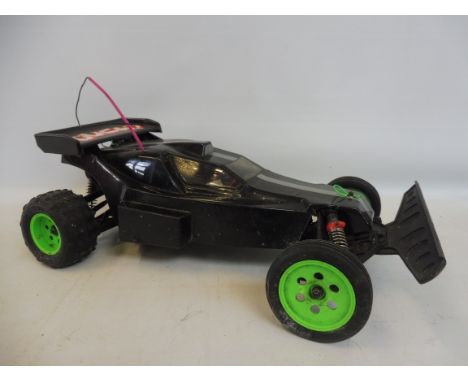 A Kyosho Raider 1:10 scale remote controlled buggy, circa 1998.