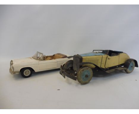 An early Chad Valley tinplate clockwork car and a Schuco Western Germany Durapo.