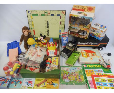 A large quantity of circa 1950s-1980s toys to include Noddy, a double pack Timpo style wild west set, Subbuteo etc.