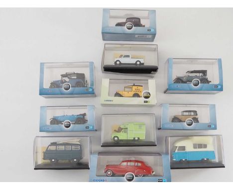 A group of 1:43 scale models by OXFORD DIECAST, comprising of Austin and Morris automobiles and vans, to include a 1934 Austi